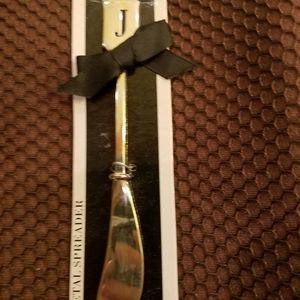 Initial J spreader